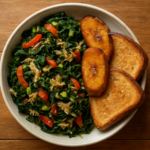 Jamaican callaloo and saltfish with toasted bread on a plate
