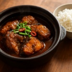 Easy Vietnamese ca kho to recipe with caramelized fish, scallions, chile, and jasmine rice